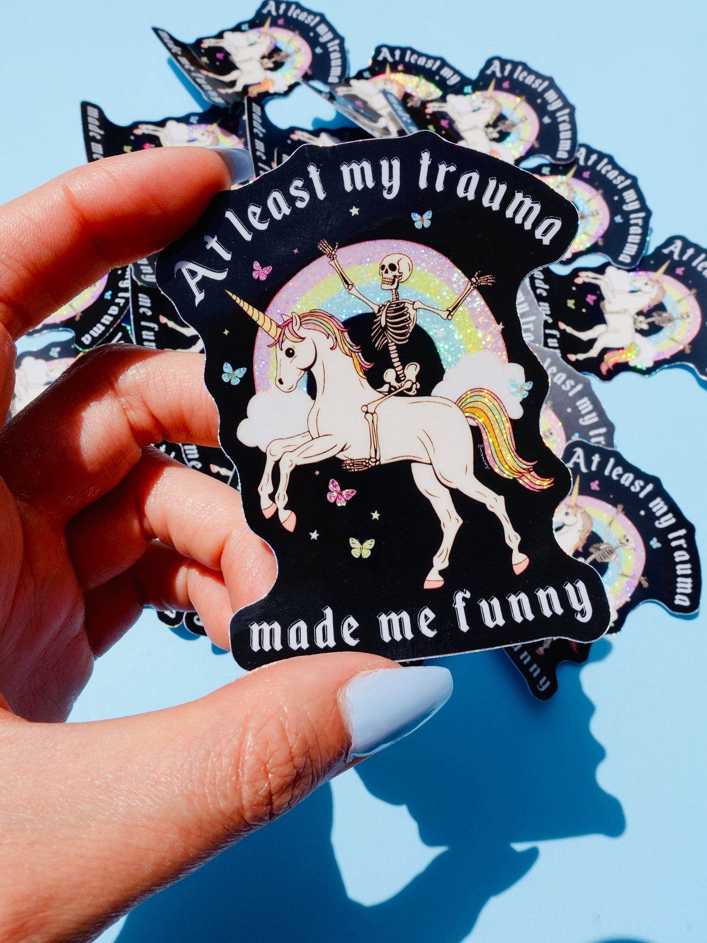 Funny Vinyl Sticker – At Least My Trauma Made Me Funny – Unicorn Skeleton Holographic Decal
